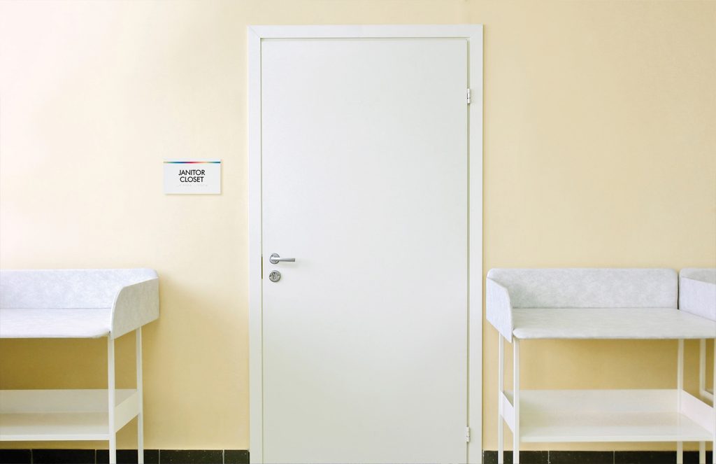 interior signage of a hospital marking janitor's closet