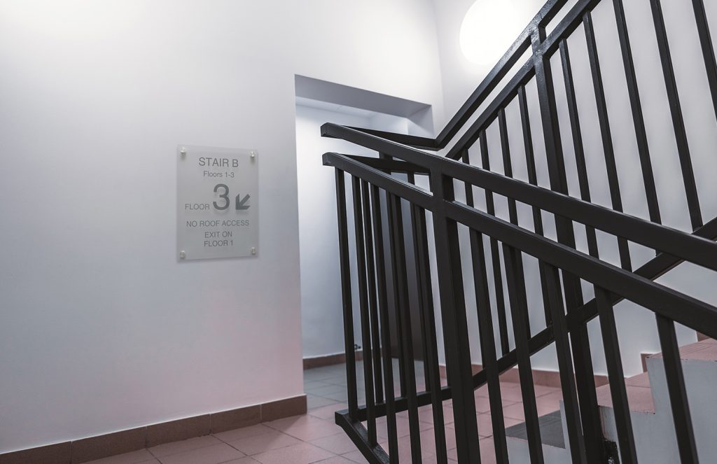 Interior signage marking the floor of the stairwell